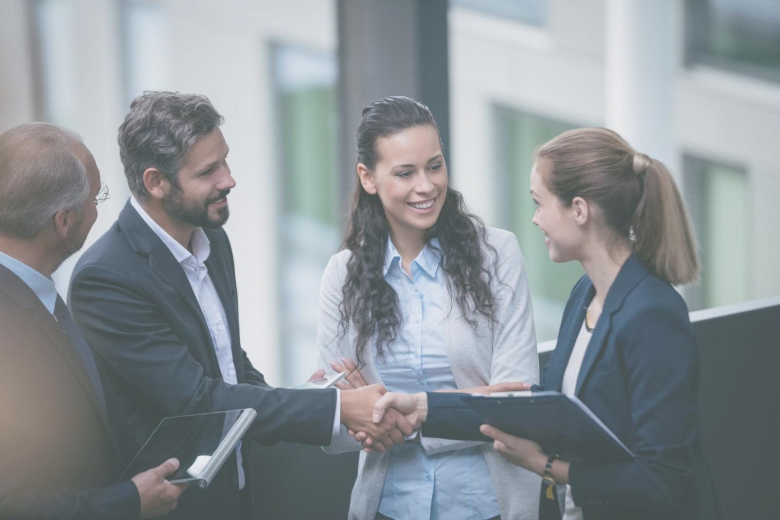 Professional team collaborating in modern office environment